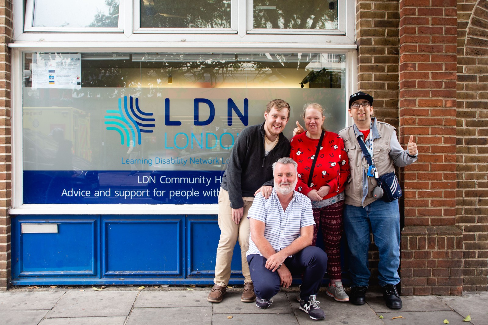 A group of people outside the LDN Community Hub