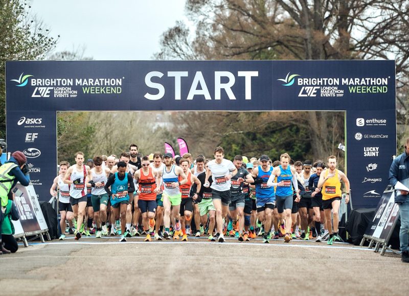 Group of runners at the start of the Brighton Marathon
