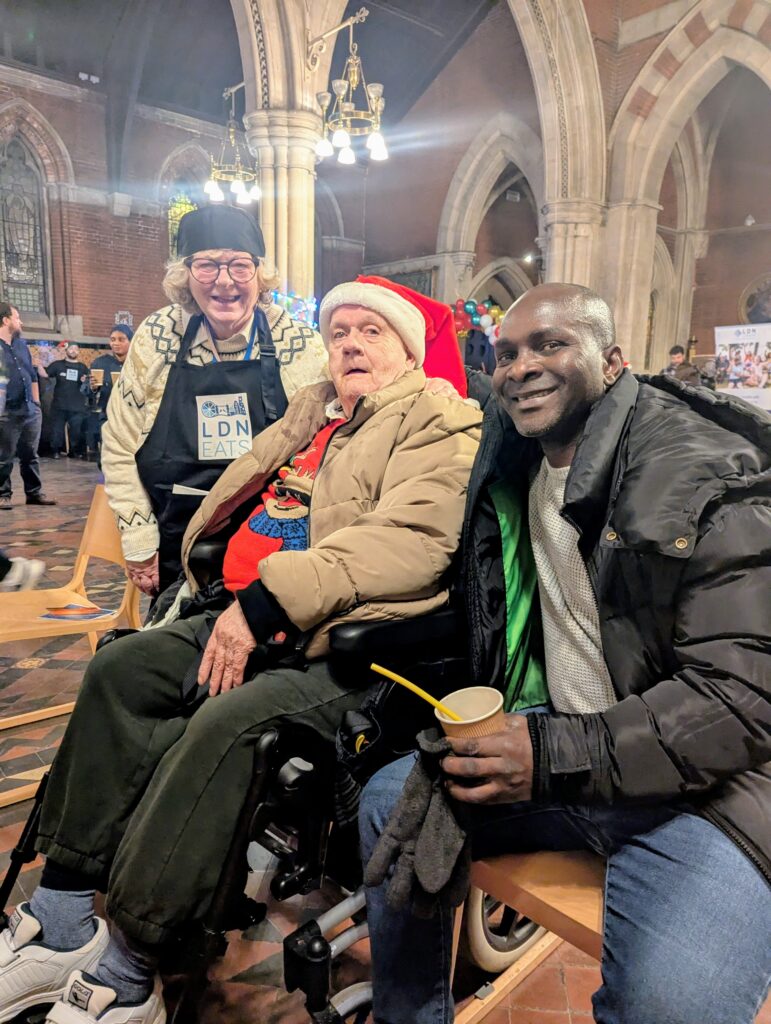 3 people posing in an event at a church